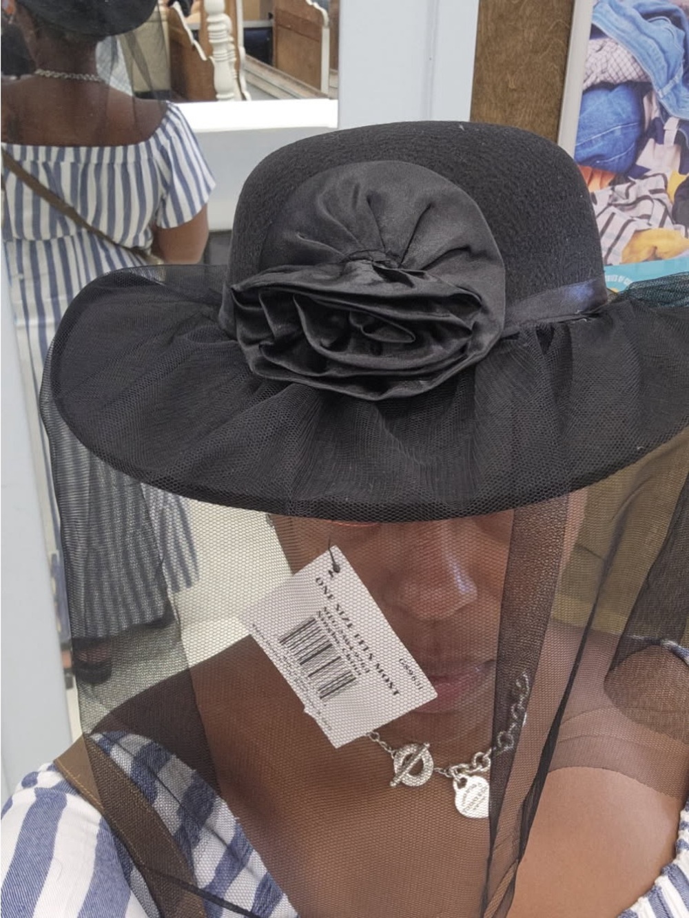 Classic Black Wide-Brim Hat with Decorative Rosette